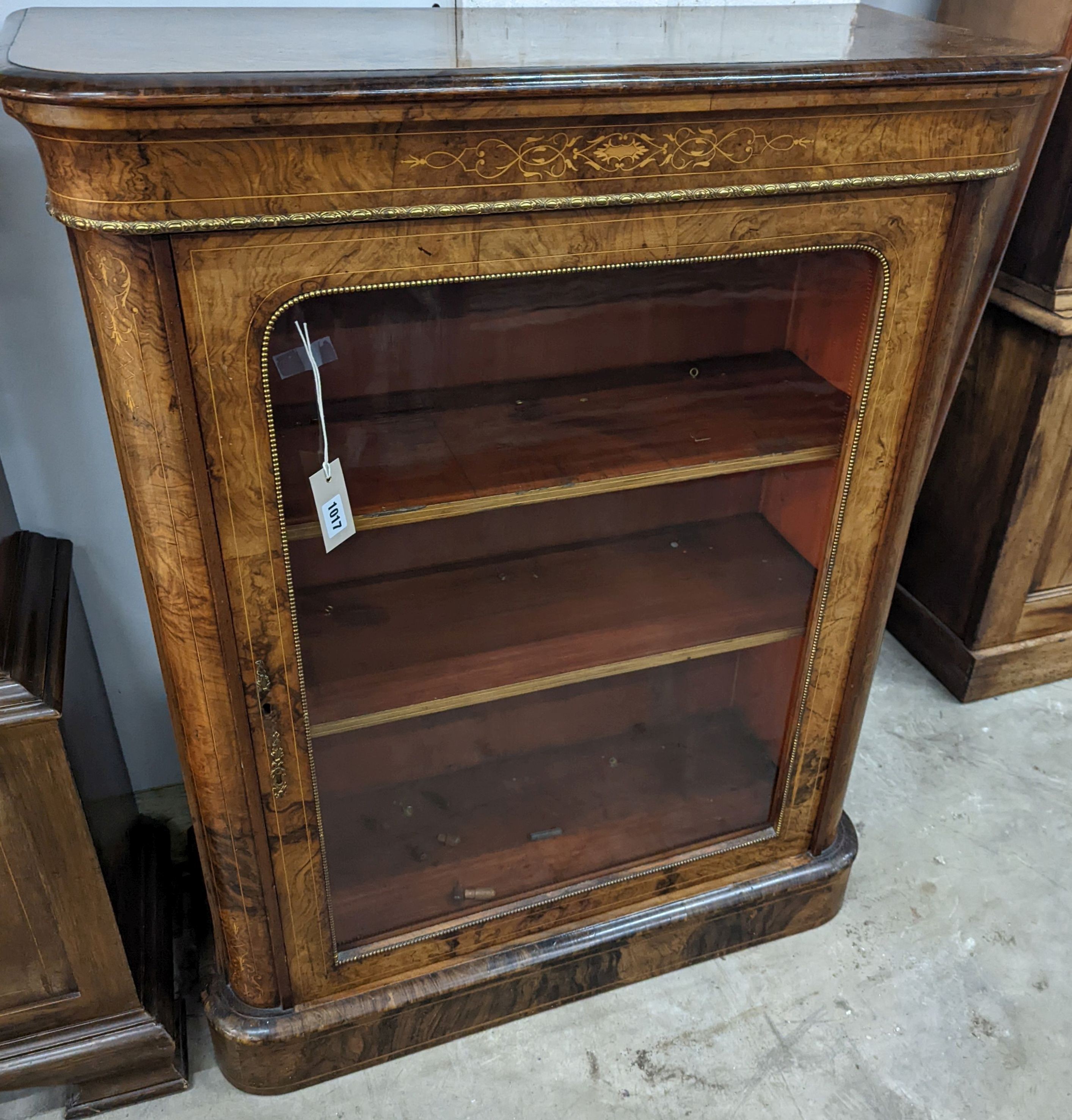 A Victorian inlaid gilt metal mounted figured walnut pier cabinet, width 84cm, depth 35cm, height 105cm